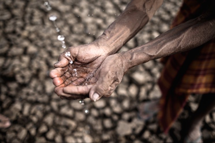 What is water scarcity and what is causing it?