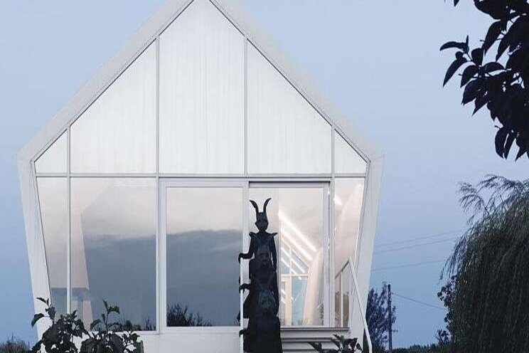 Greenhouse-inspired home harvests rainwater