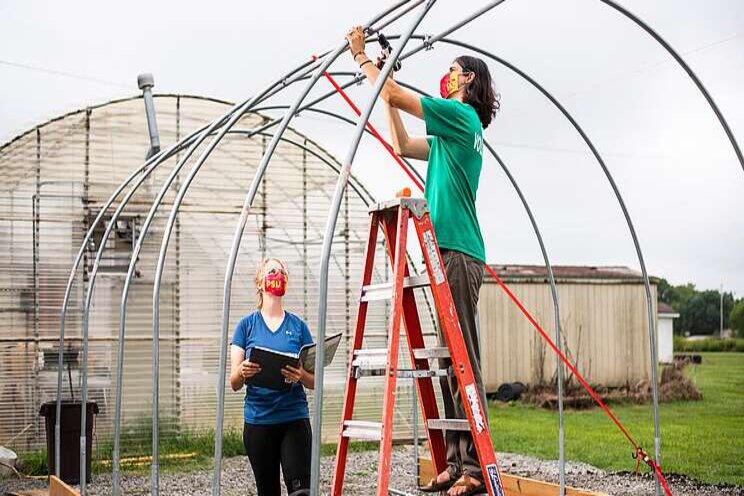 PSU students build greenhouse, aquaponics system